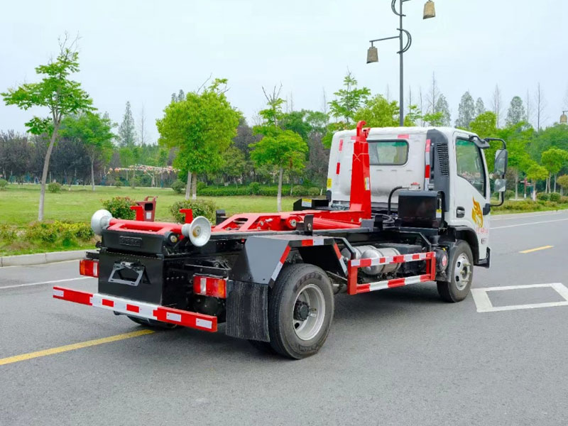重汽豪曼3280軸距藍(lán)牌勾臂垃圾車(chē)