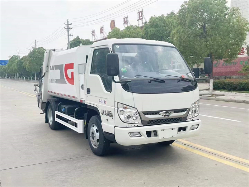 福田小卡藍(lán)牌壓縮垃圾車便捷高效的城市環(huán)保利器
