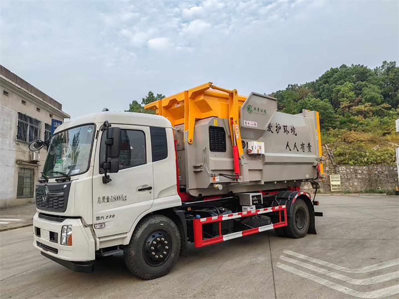 東風(fēng)天錦勾臂垃圾車可匹配12立方移動式壓縮垃圾箱