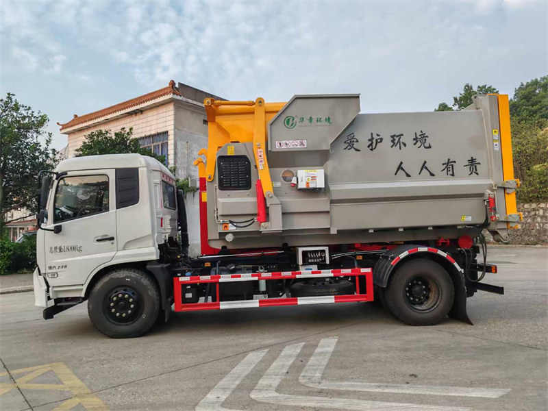 東風(fēng)天錦勾臂垃圾車可匹配12立方移動式壓縮垃圾箱