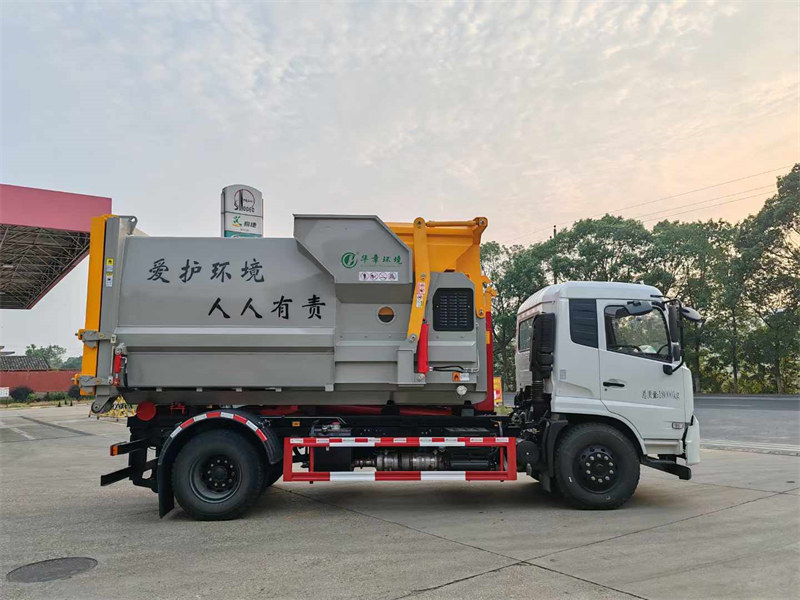東風(fēng)天錦勾臂垃圾車可匹配12立方移動式壓縮垃圾箱